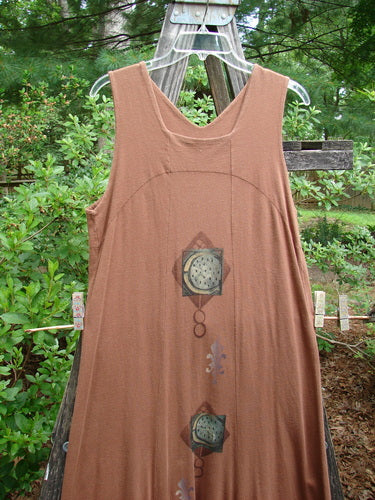 1998 Arcadia Jumper Harvest Moon Rockwood Altered Size 1 displayed on a clothes rack, featuring a double-paneled bodice, downward yoked empire waist, and sectional full-length panels with harvest moon theme design.