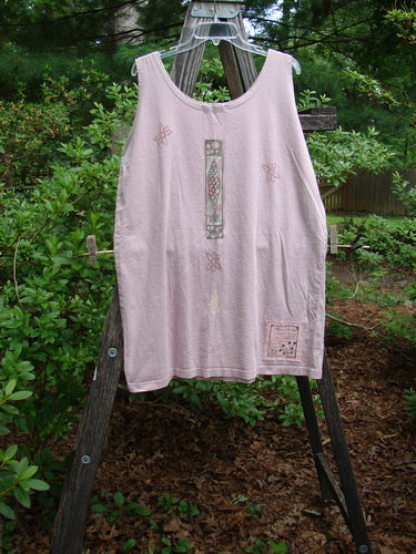 1995 Sun Glint Tank Fancy Fish Patio Rose Altered OSFA displayed on a wooden ladder, featuring a scooped neckline and a unique fish design. Ideal for hot days or layering.