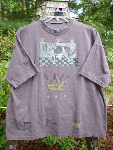 Alt text: 1995 Short Sleeved Tee Silly Pup Bloomsberry Altered Size 2, featuring a dog illustration, thicker ribbed neckline, drop shoulders, and a slightly shorter boxy shape.
