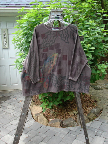 Barclay Cotton Hemp Dolman Sleeve Pullover Top Abstract Continuum Stone OSFA displayed on a rack, showcasing its wide boxy shape and dolman sleeves, ideal for fall.