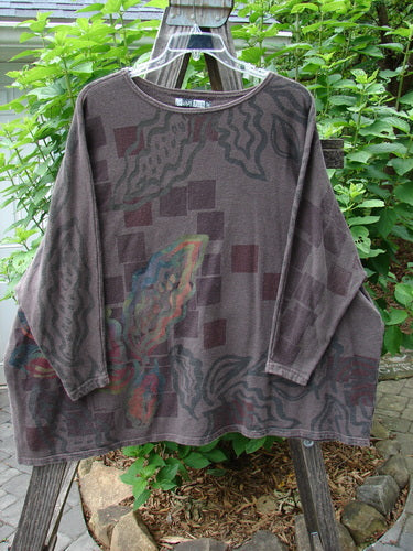 Barclay Cotton Hemp Dolman Sleeve Pullover Top Abstract Continuum Stone OSFA displayed on a wooden rack, showcasing its wide boxy shape and dolman sleeves, reflecting Bluefishfinder.com's vintage and creative style.