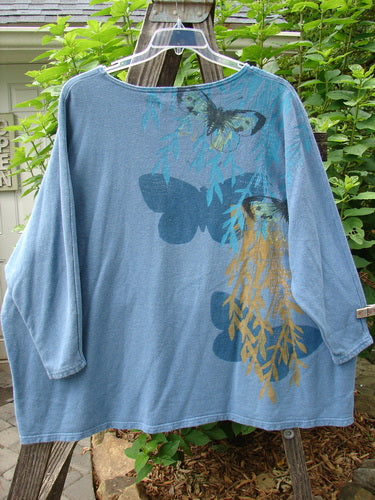 Barclay Cotton Hemp Dolman Sleeve Pullover Top Butterfly Blue Dusk OSFA, showcasing a wide boxy shape, dolman sleeves, and an all-over butterfly pattern, perfect for fall.