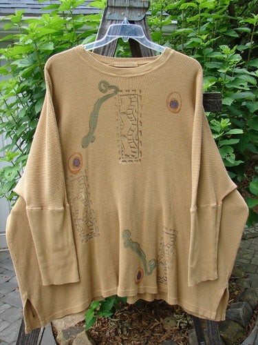 1995 Thermal Studio Pullover Tunic Abstract Road Burnished Gold OSFA displayed on a hanger, showcasing vented sides, ribbed sleeves, and a relaxed drape, emphasizing the unique abstract road theme design.