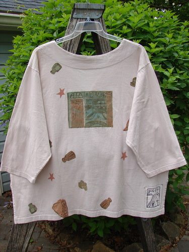 1993 Resort PJ Top Diner Treat Tea Dye Size 2, featuring 'RELAXATION' graphic, seashell motifs, and Blue Fish Signature Patch on back, displayed on a hanger against a leafy background.