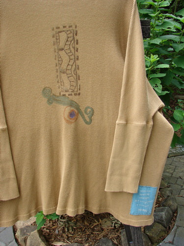 1995 Thermal Studio Pullover Tunic Abstract Road Burnished Gold OSFA, featuring whimsical abstract road design, ribbed lower sleeves, vented sides, and signature blue patch on the back.