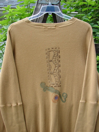 1995 Thermal Studio Pullover Tunic featuring an abstract road design and ribbed lower sleeves in Burnished Gold. This rare, weighted cotton piece offers a relaxed drape with vented sides and Blue Fish patch.