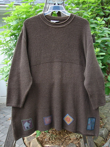 Barclay Patched Favorite Rollneck Alpaca Cotton Tunic Sweater Treeba OSFA displayed on a hanger, showcasing its thicker knit, generous shape, empire waist, ribbed mock turtleneck, and vintage-inspired painted patches.