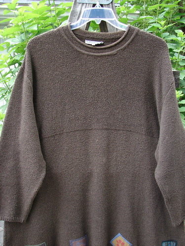 Barclay Patched Favorite Rollneck Alpaca Cotton Tunic Sweater Treeba OSFA displayed on a hanger, showcasing its thick, substantial knit and detailed design elements, including a double-rolled ribbed mock turtleneck.