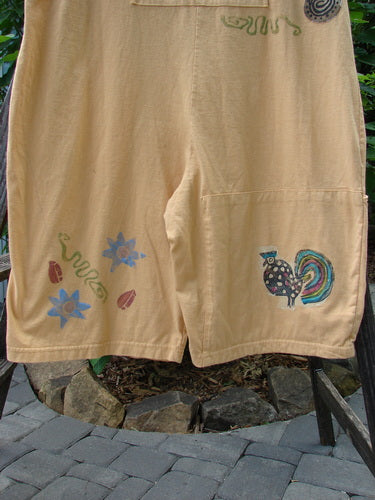 Alt text: 1991 PMU Farmer Brown Overall Pant Jumper with painted rooster and flower designs, featuring front pockets and vintage rear rooster patch.