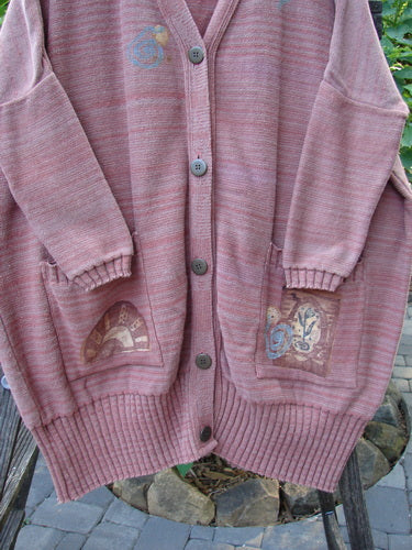 1995 Fireside Cardigan Sweater Single Sprig Marled Brick OSFA featuring metal buttons, ribbed hem, deep neckline, drop shoulders, oversized pockets, and intricate design details.