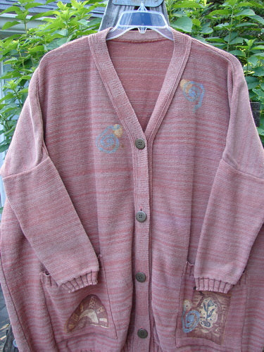 1995 Fireside Cardigan Sweater Single Sprig Marled Brick OSFA featuring a deep neckline, flared hips, oversized front pockets, metal buttons, and ribbed hem. Vintage Blue Fish Clothing from Bluefishfinder.com.