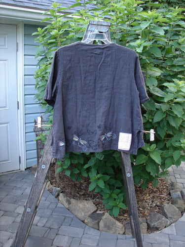 1999 Handkerchief Camp Shirt Dragonfly Raven Altered Size 1 displayed on a hanger, features butterfly print, A-line shape, vented sides, and shell buttons.