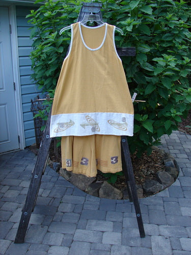 1998 8 Ball Tunic Parcheesi Short Duo Lemonade Size 0 displayed on a rack, showcasing the tunic's scoop neckline, A-line shape, and coordinating shorts with a wide leg and deep pockets.