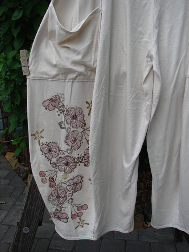 Barclay Exterior Stitch Plane Pant Cherry Blossom Natural Dew Size 2, featuring pink floral pattern on white fabric, full-length exterior vertical seams, wide lowers, and deep-rise double front drop pockets.