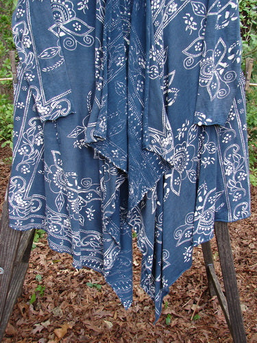 Magnolia Pearl Cotton Jersey Kareas Cardigan Jacket Navy Ranch Hand OSFA displayed on a wooden stand, showcasing its knot-able hemline, open front, and signature bandana print.