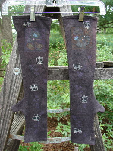 Barclay Cotton Lycra Hemp Fingerless Glove Flower Window Plum OSFA draped on a wooden ladder, showcasing its unique flower window design and four-finger opening, emphasizing its cozy and stretchy fit.