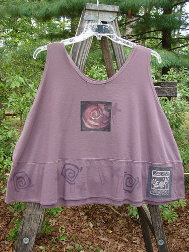 1995 Klee Button Top Salvador Heliotrope Size 2 features a purple tank top with a graphic design, scooped neckline, and a hand-stamped ceramic button on the pocket.