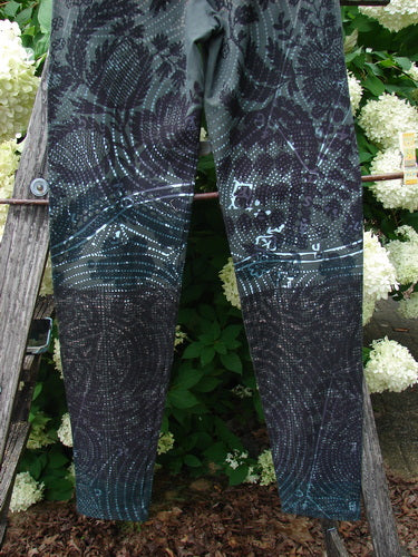 Daisy Hagey Barclay NWT Cotton Lycra Heavy Weight Legging Night Spin Boreal Size 1 in dark blue and black cotton lycra, shown hanging outdoors against greenery and white flowers.