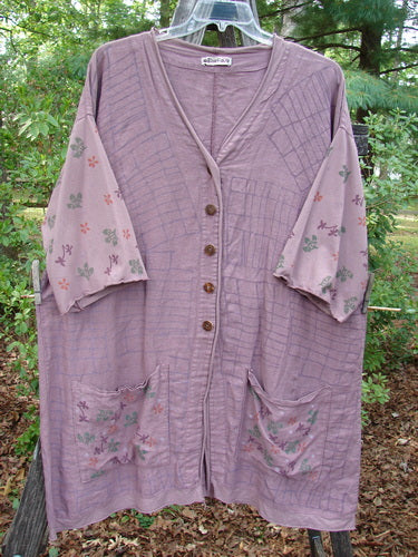 Barclay Linen Cotton Sleeve Pocket Cardigan Rich Mauve Size 0 featuring floral-patterned organic cotton sleeves, a wooden button curved front, deeper V neckline, and drop front squared pockets.