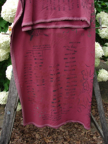 Bluefishfinder.com Barclay Heavy Weight Organic Sweatshirt Blanket Owl Forest Trimmed Burgundy OSFA, a burgundy sweatshirt-style blanket with dark owl-and-forest print and matching trim. It hangs folded over a rustic wooden stand, with a soft, heavy knit texture and layered edges.