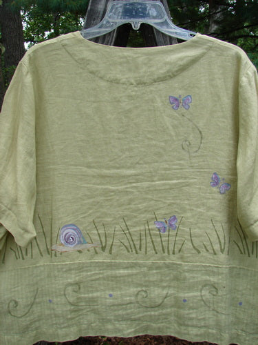 1999 Cabana Top Butterfly Grass Citron Size 2, featuring hand-painted butterflies and snails, shell buttons, a sweet drop pocket, and a varying hemline, exemplifies Bluefishfinder's vintage, artistic clothing style.