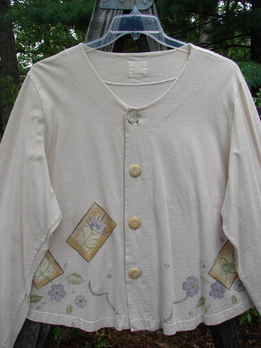 1999 Coffee Top Flowerpot Tea Dye Floral Size 2: White shirt with floral design, sweeping rounded hemline, drawcord back, and A-line swing style. Made from organic cotton, part of the Spring 1999 collection.