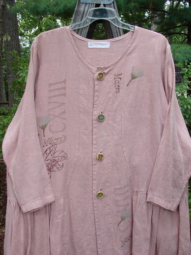 1998 Botanicals Meadow Jacket Macro Mallow Size 1, featuring gold ceramic buttons, a wide A-line shape with a bottom flounce, and a scooped neckline. Made from heavier weight linen.