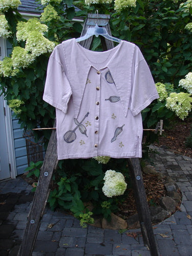 1994 Compass Top Mixed Garden Plave Size 1 featuring a big pointed collar, original buttons, side vents, and detailed garden theme design, displayed on a wooden hanger.