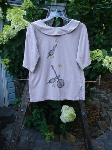 1994 Compass Top Mixed Garden Plave Size 1 featuring a big pointed over collar, original BF buttons, side vents, and detailed garden-themed paint with a flower and ladder drawing.