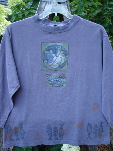 1996 Long Sleeved Tee Earth Sky Sea Mulberry Size 0 featuring an Earth and airplane design on the front, rounded ribbed neckline, and boxy crop shape, made from medium-weight organic cotton with light wear and even fade.