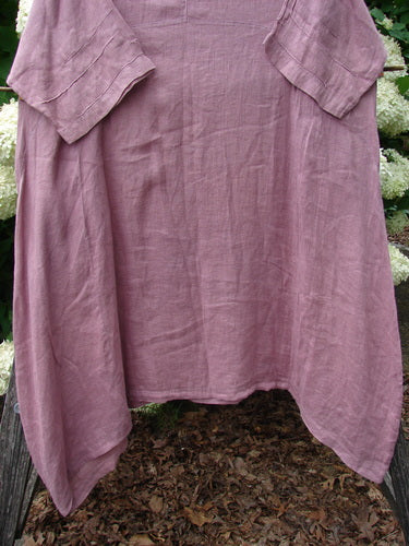 Bluefishfinder.com Barclay Linen Wave Pocket Dress in dried sprig tulsi rose, Size 1, is a loose linen dress with a softly wrinkled texture, short sleeves, and oversized front pockets. The mauve fabric hangs in a relaxed A-line shape.