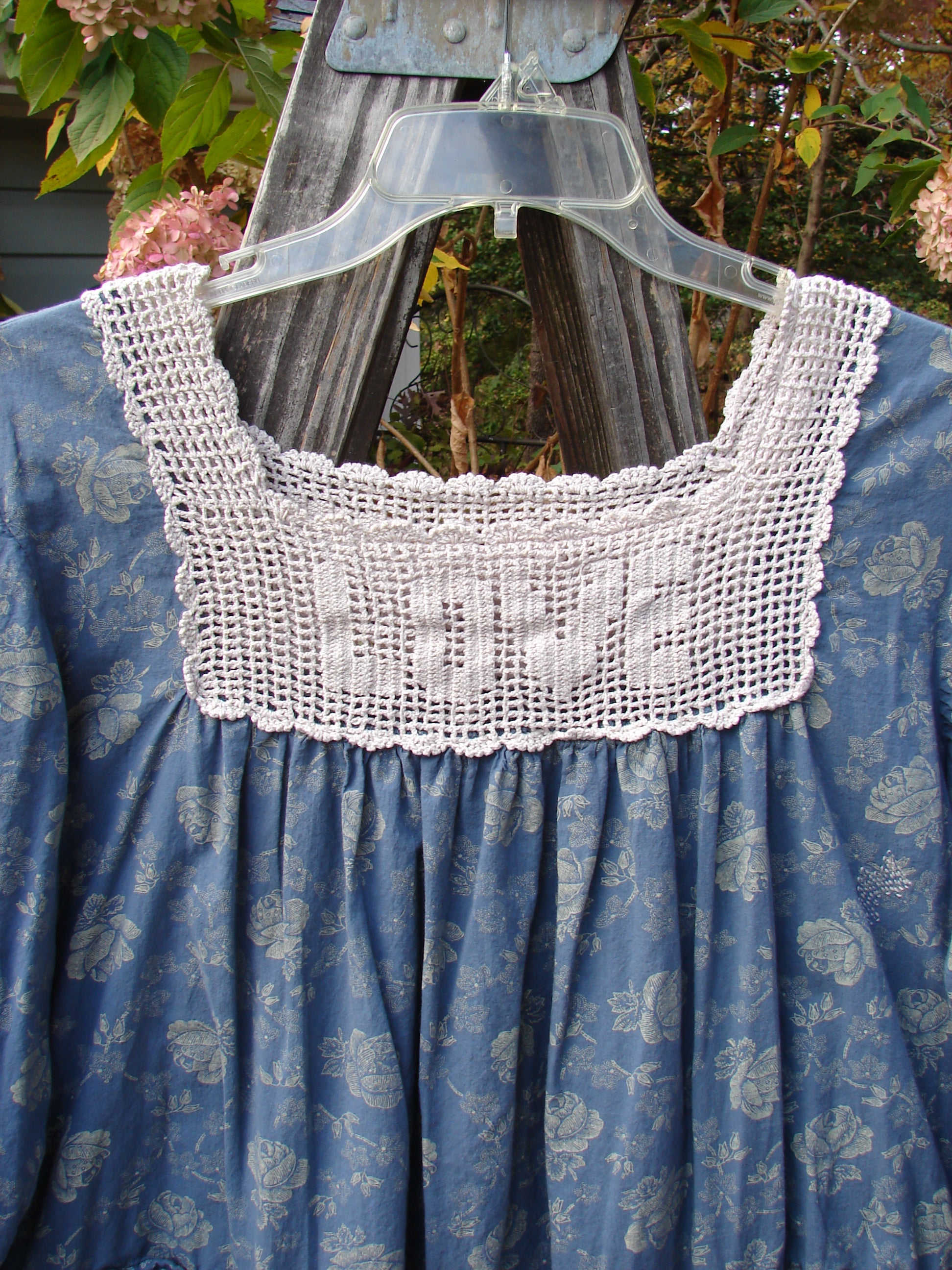 Magnolia Pearl European Cotton Crochet Love Tunic Vintage Blue Rose OSFA featuring white lace details, three-quarter sleeves, A-line shape, and exterior pockets, reflecting vintage-inspired design from BlueFishFinder.com.