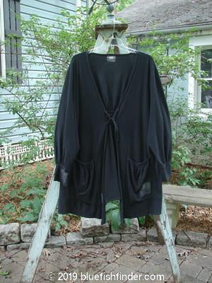 2000 Crepe Rennai Jacket Celtic Black Size 2: A black swing jacket with unique front and back ties, pointed hems, and gathered cuffs.