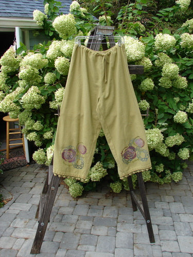 1999 Flannel PJ Pant with Pom Pom Rose Leaf design, size 2, on a rack.
