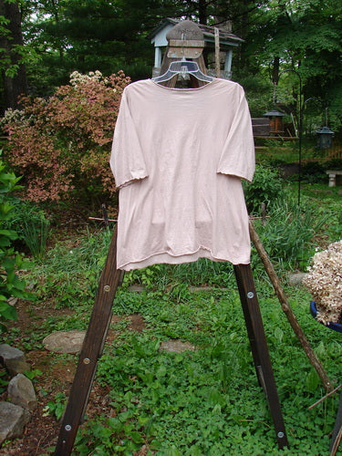 Barclay Batiste Curl Edge Layering Top Unpainted Pastel Mauve Size 1: A shirt with a curly neckline and hem, almost three-quarter length sleeves with curly edges, and a straighter lower shape on a swinger.