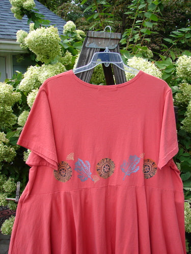 1997 Ocean Pearl Dress with star coral design on pink shirt, size 2.