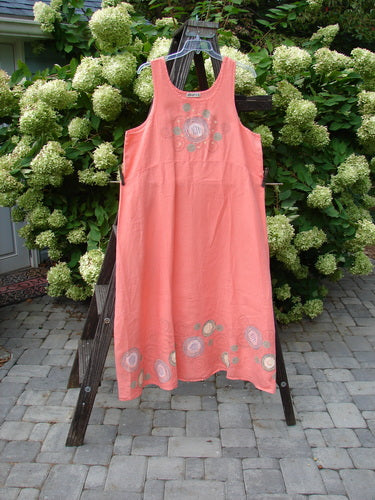 Barclay Linen A Line Shift Dress Circle Spin Tangerine Size 2: A dress on a wooden ladder with a rounded neckline and empire waist seam. Fully sweeping lower skirt and not too deep arm openings.