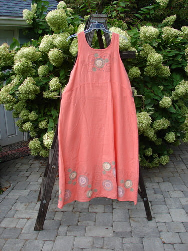 Barclay Linen A Line Shift Dress Circle Spin Tangerine Size 2: A pink dress on a rack, featuring a rounded neckline, downward curved empire waist seam, and a fully sweeping lower skirt. Bust 48, Waist 50, Hips 58, Length 54, Hem Circumference 90.