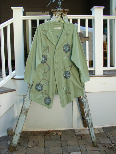 1996 Boulevard Jacket Giant Pinwheel Spanish Moss Size 0: A funky, tailored jacket with a button-accented collar, shirttail hemline, and side pockets. Perfect for Blue Fish collectors!
