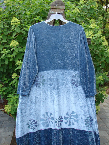 1997 Velvet Aditi Dress, a blue dress on a swinger. Long flowing shape, belled weighted lower half, deep side pockets. Waist and lower skirt adorned with sheer iridescent ribbon. Bust 52-54, waist 52-54, hips 62, length 52 inches.
