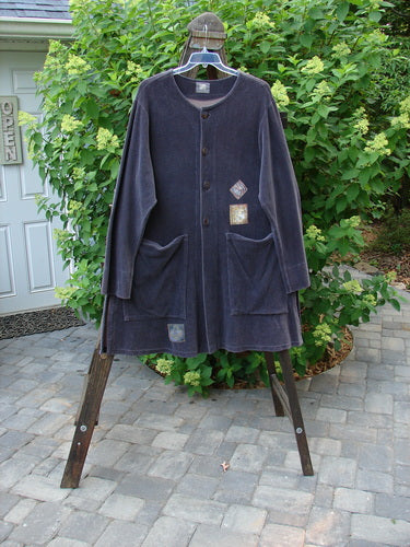 1999 Stretch Cord Patched Robe Jacket Dusk Forest Grey Plum Size 1: A long blue coat with painted forest patches and foldable cuffs.