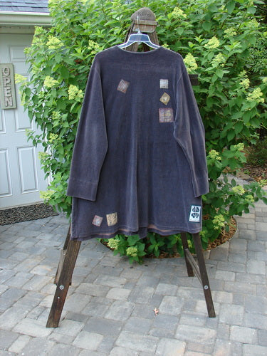 1999 Stretch Cord Patched Robe Jacket Dusk Forest Grey Plum Size 1: A long-sleeved shirt on a swinger with painted patches in a forest theme.