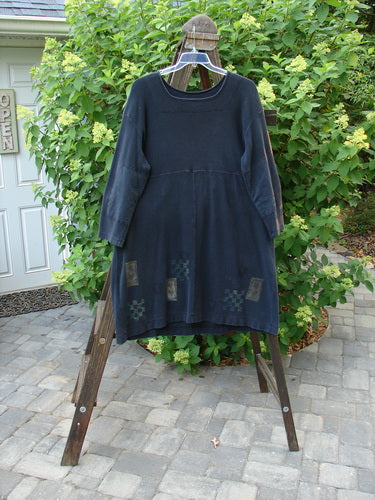 1999 Thermal Home Dress Tiny Double Heart Black Size 1: A blue dress on a swinger with a close-up of a sign and clothes on a ladder.