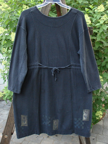 1999 Thermal Home Dress Tiny Double Heart Black Size 1: A black dress on a swinger with a squared off neckline, elbow patches, and unique sectional panels. Bust 54, Waist 52, Hips 54, Length 40.