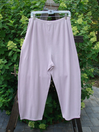 Barclay Thermal Single Pocket Pant on clothesline, made from Medium Weight Cotton Thermal. Features include: Full Elastic Waistline, Slightly Tapered Shape, Longer Inseam, Longer Wider Fall, Painted Exterior Pocket Accent, Vertical Stitchery. Waistline Relaxed 30, Fully Extended 40, Hips 56, Inseam 22, Length 37.