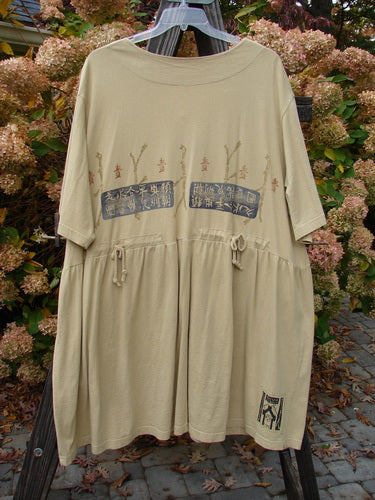 Image alt text: "1999 Vintage Button Dress Asian Aesthetic Honey Size 2: Beige dress with writing, featuring 11 buttons down the front, layered vintage buttons at the waist, and pockets. Pleated with folds of fabric and Asian aesthetic theme paint. Blue Fish Patch."