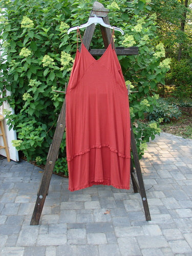 2000 Wool Pointelle Lulu Slip Dress Sienna Unpainted Tiny Size 2: A red dress on a wooden ladder, featuring sweet eyelets, thin shoulder straps, and a unique criss-cross upper bodice.