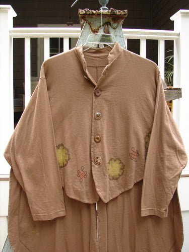 1997 Tails Jacket with a flower design on a brown shirt. Mandarin style mock neckline, oversized shiny textured brown buttons, and flared hip tails.