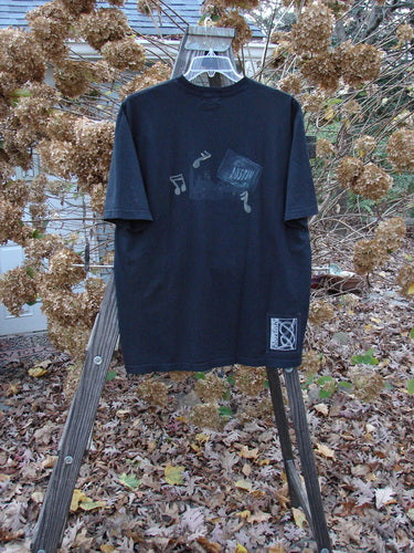 2000 Short Sleeved Tee Austin Texas Black Size 1: A black shirt with a thicker ribbed neckline and a classic Austin Texas theme paint. Features a Blue Fish patch.