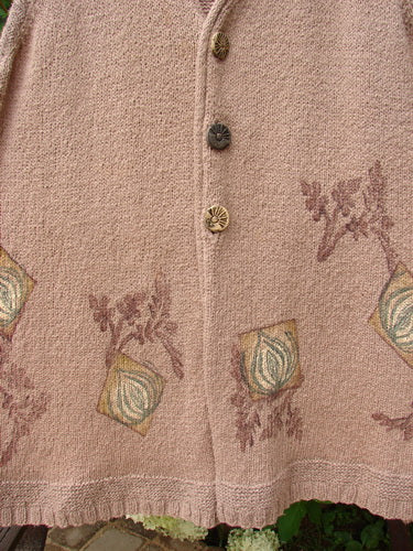 1998 Teton Sweater Vest: Close-up of a sweater with alternative stitching, colorful ceramic buttons, and a deeper V neckline.